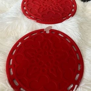 - Brand new with tag lot of two Le Creuset silicone french trivet